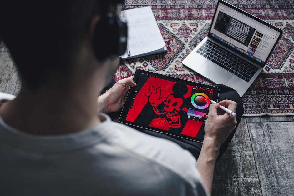 artist drawing with digital tablet