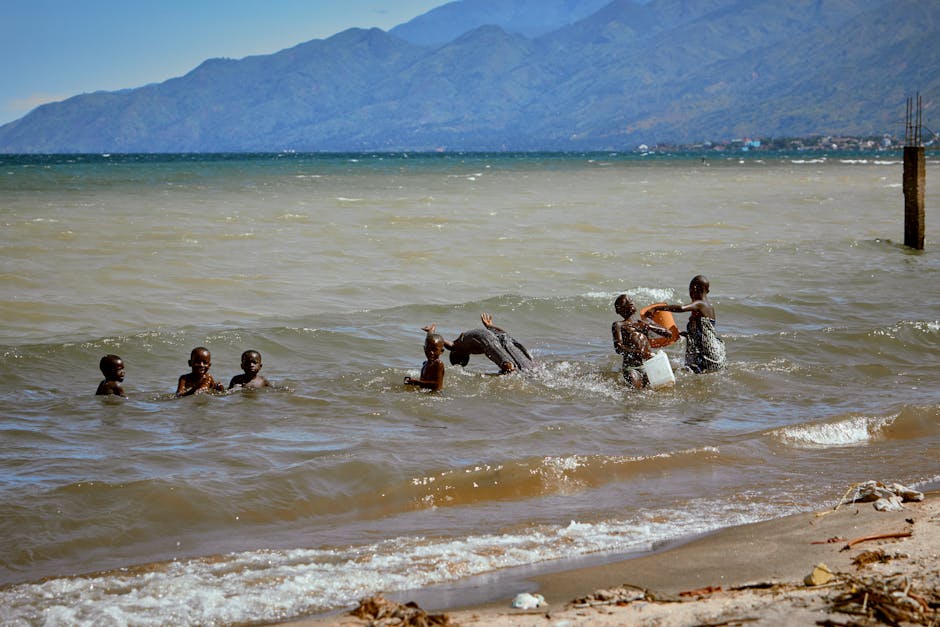 children playing in a lake