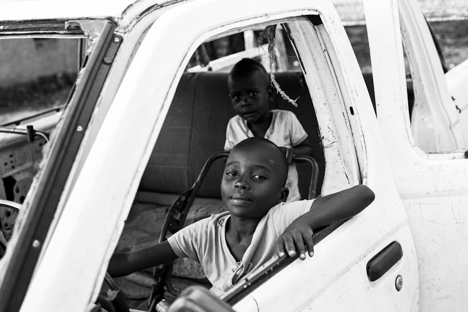 children playing in car trip