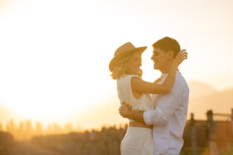 couple picnicking in vineyard