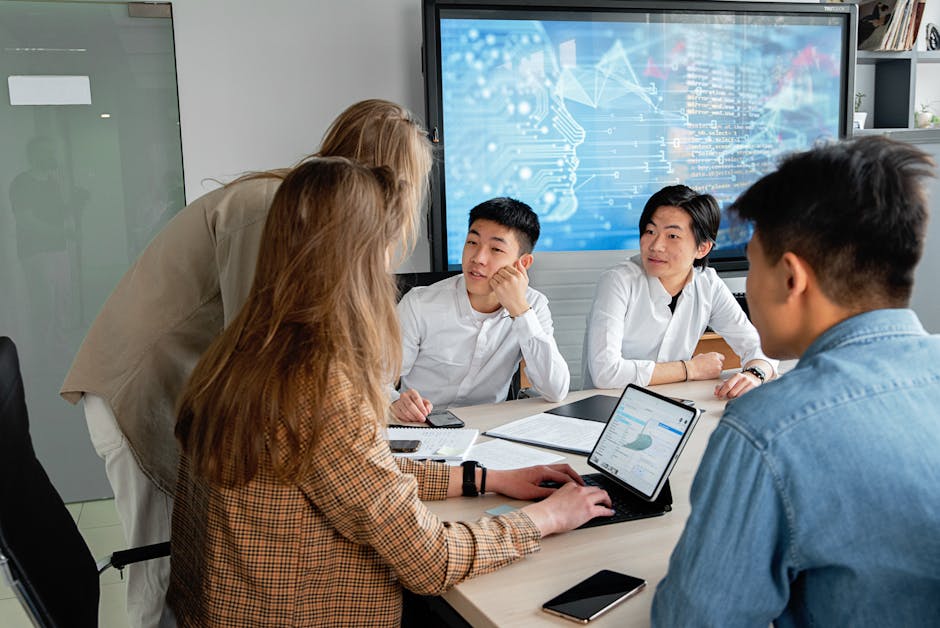 diverse team collaborating on a project with a futuristic interface