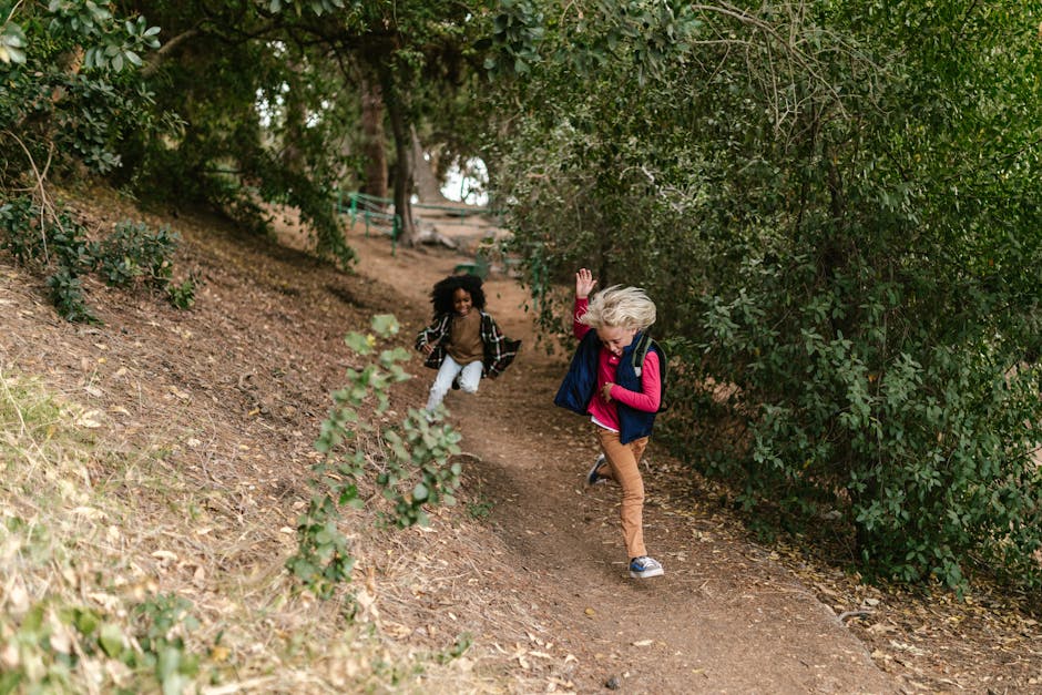 Kids playing on a hiking trail in nature