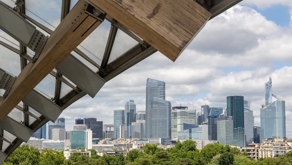 Modern city skyline with prominent landmark