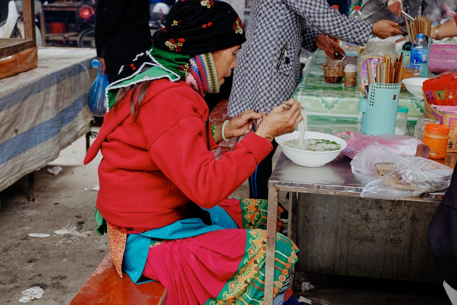 person eating street food market