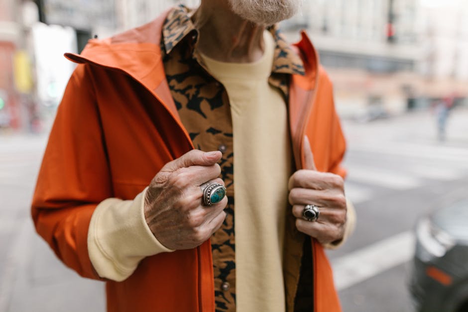 person in stylish layered outfit walking city street