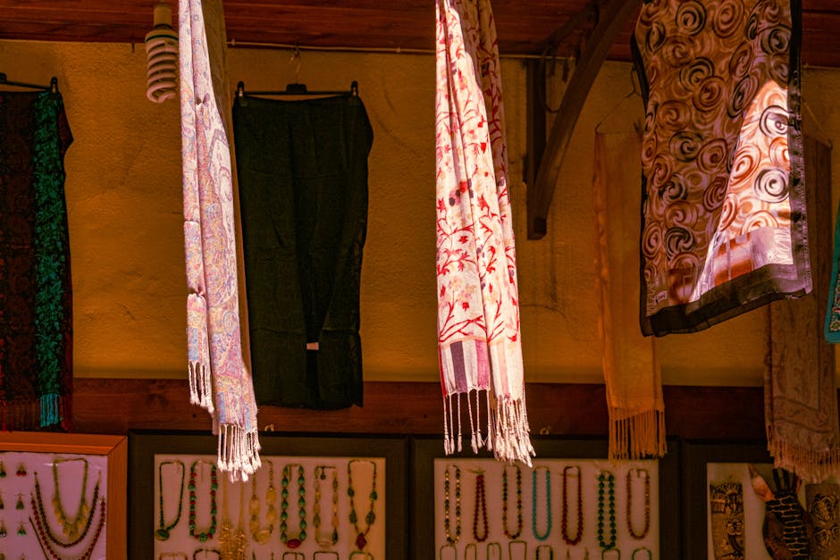 stylish accessories like scarves, belts, and jewelry on a display