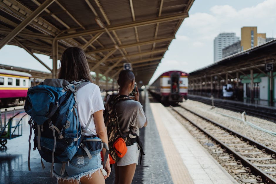 train station platform with backpacker
