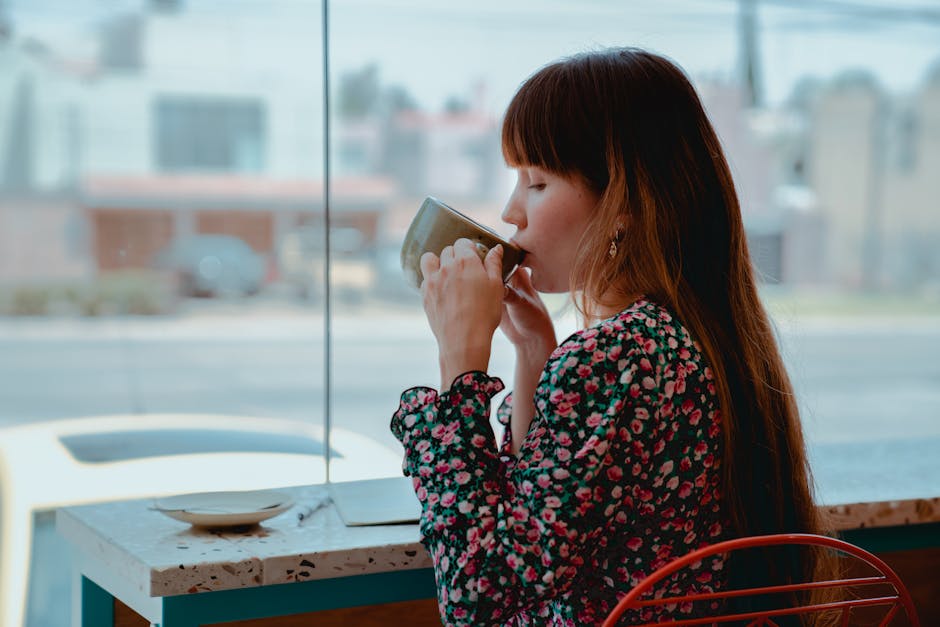 woman drinking coffee cafe