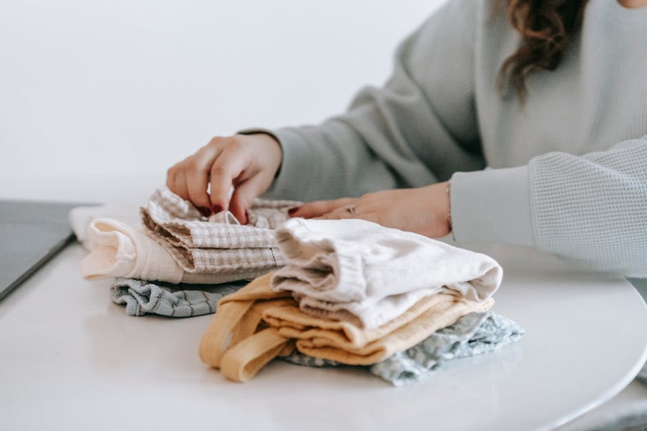 woman folding clothes