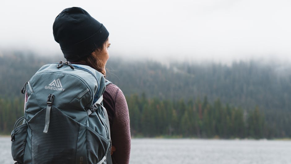 woman hiking with small backpack