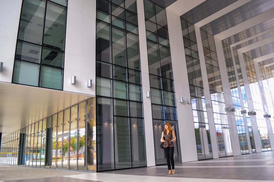 woman in elegant office outfit in modern building