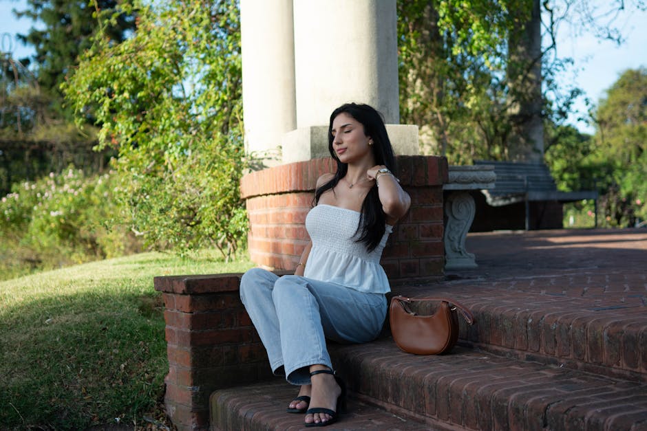 woman in elegant spring outfit at park