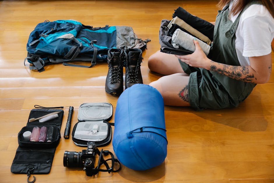 woman packing backpack clothes