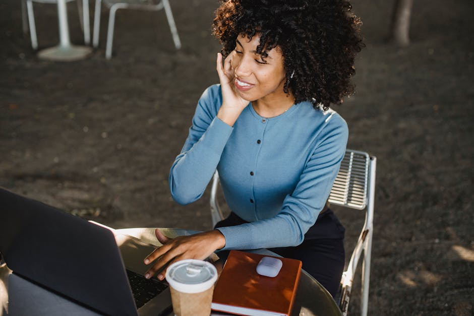 woman smiling and working