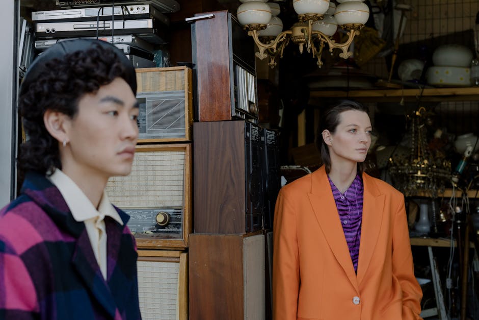 woman trying on a blazer in a second-hand shop