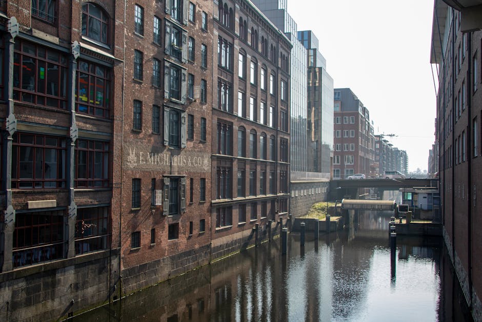 woman walking along historic Hamburg canals