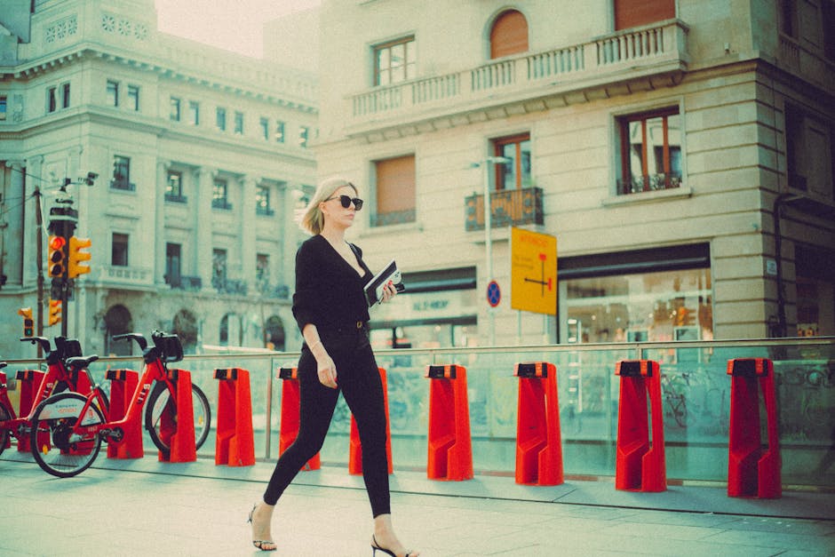 Woman walking city street minimalist outfit