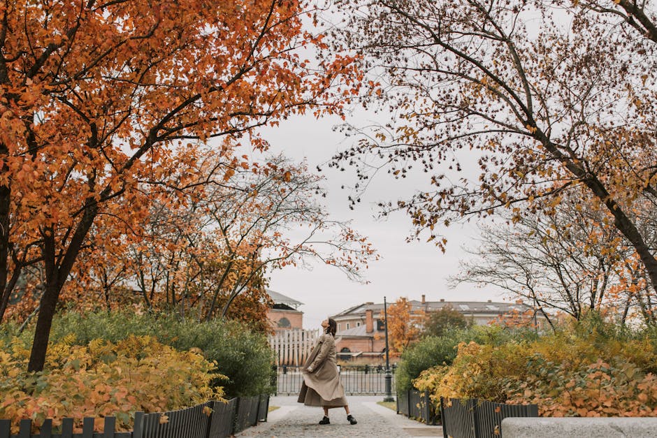 woman walking in city in autumn