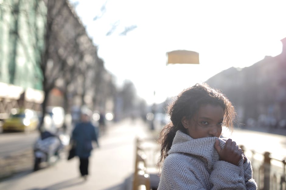 woman walking in winter coat city