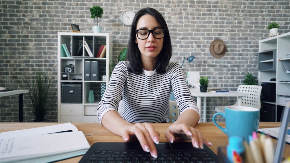woman working efficiently at modern office desk