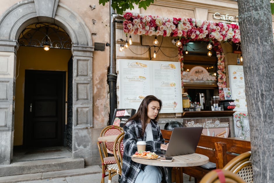 woman working laptop cafe