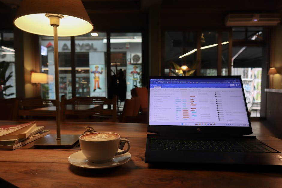 cozy cafe interior with laptop