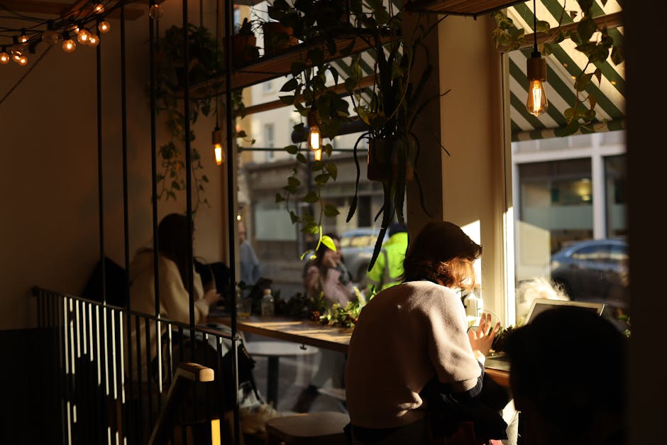 Cozy cafe interior with people