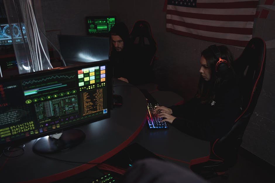 Cyber security team defending digital network in war room