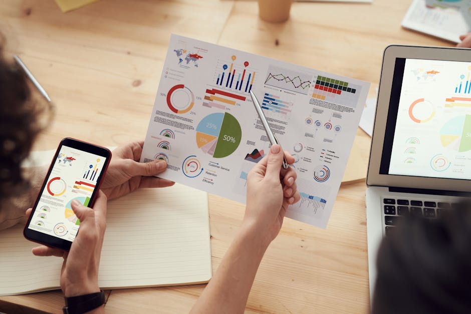 Data scientists analyzing complex charts