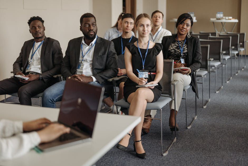 diverse group of professionals attending AI workshop