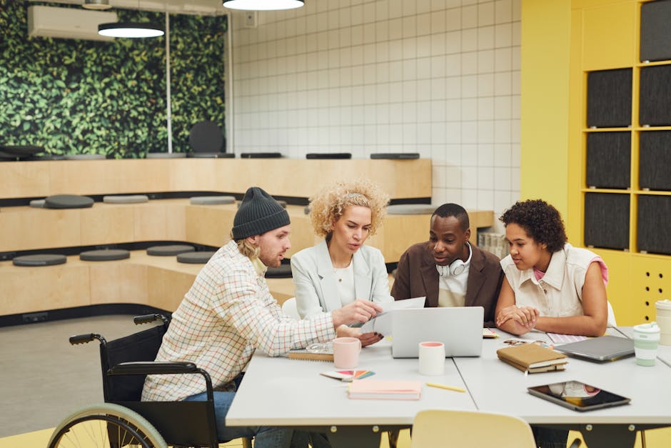 diverse startup team collaborating in modern office