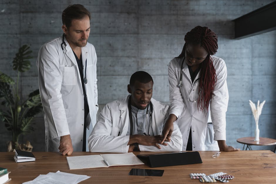 Doctors consulting AI medical assistant on tablet