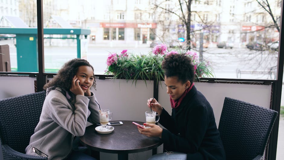 friends talking in cafe no phones