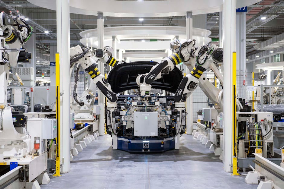 futuristic factory floor with robotic arms