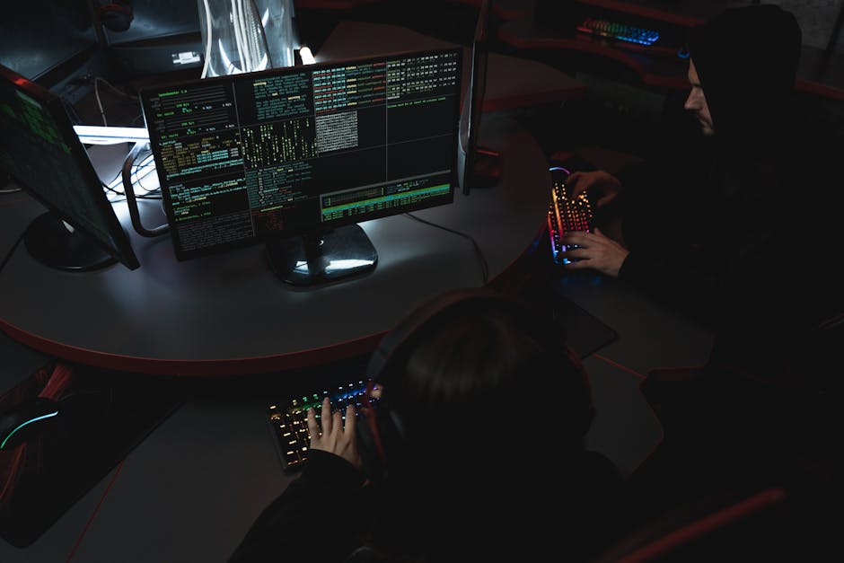 group of diverse people coding on computers