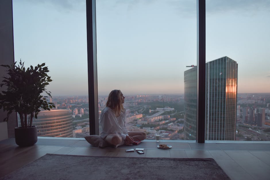 Meditating woman peaceful city apartment