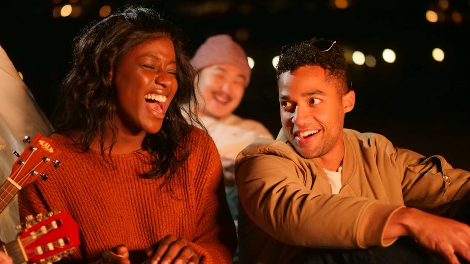 people laughing campfire stars