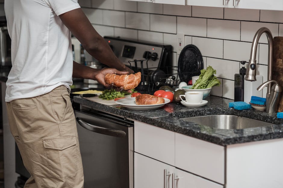person cooking healthy meal in modern kitchen