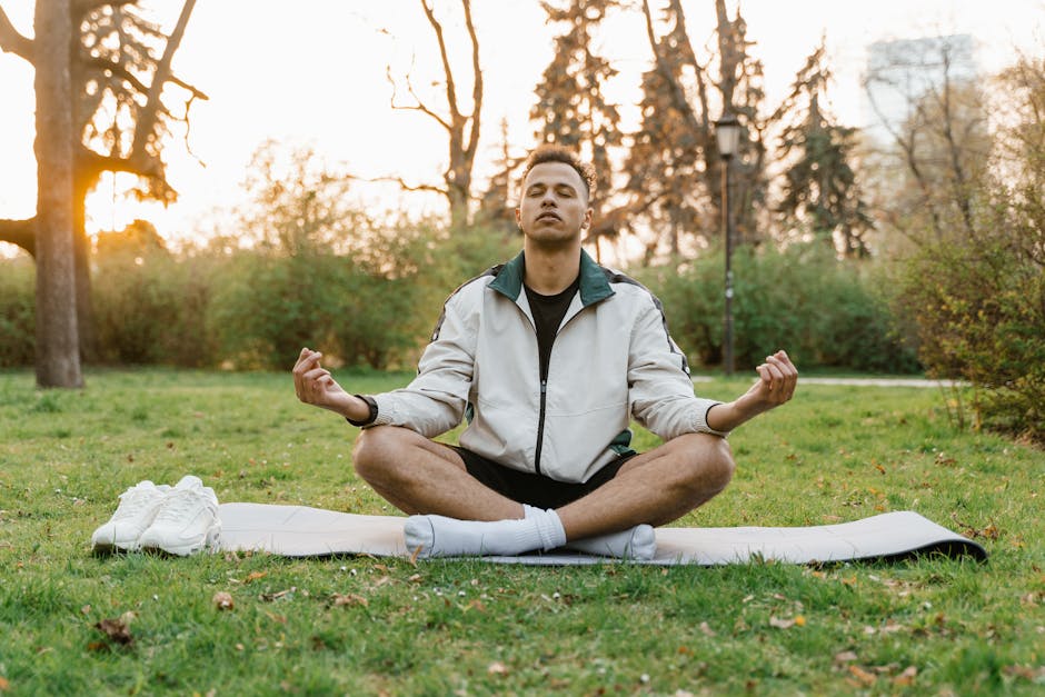 person meditating in nature