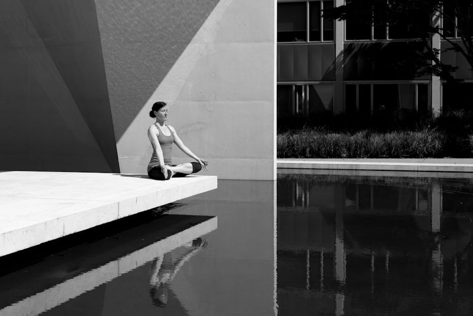 person meditating in urban environment