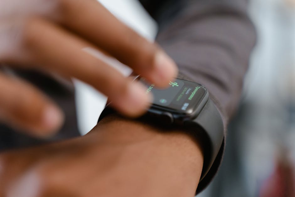 person meditating with smart wearable device