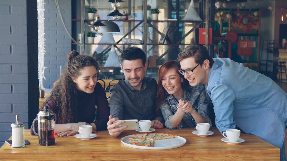 students laughing cafe
