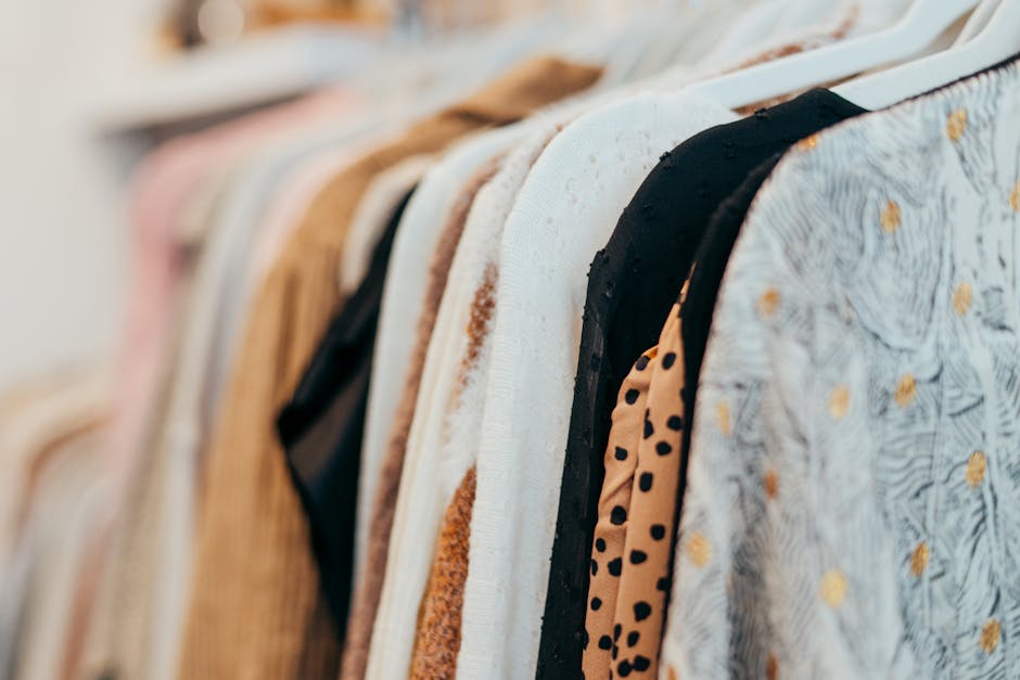 stylish clothes hanging in boutique