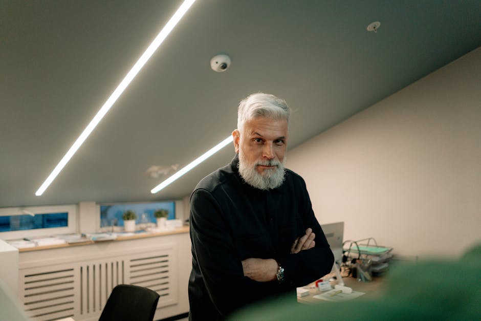 Stylish man in contemporary vyshyvanka office setting