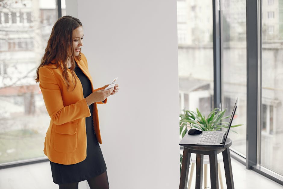 Stylish young professional working in modern Ukrainian office
