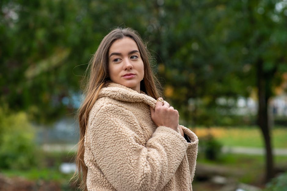 Trendy Ukrainian girl wearing teddy coat urban setting