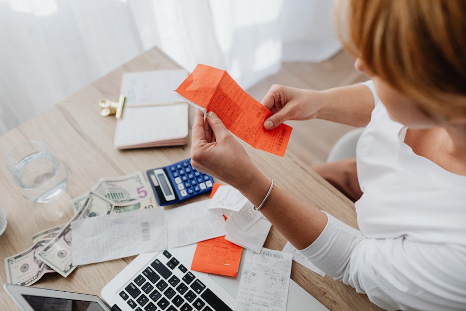 Woman budgeting finances at home