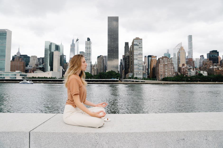 Woman meditating in modern office