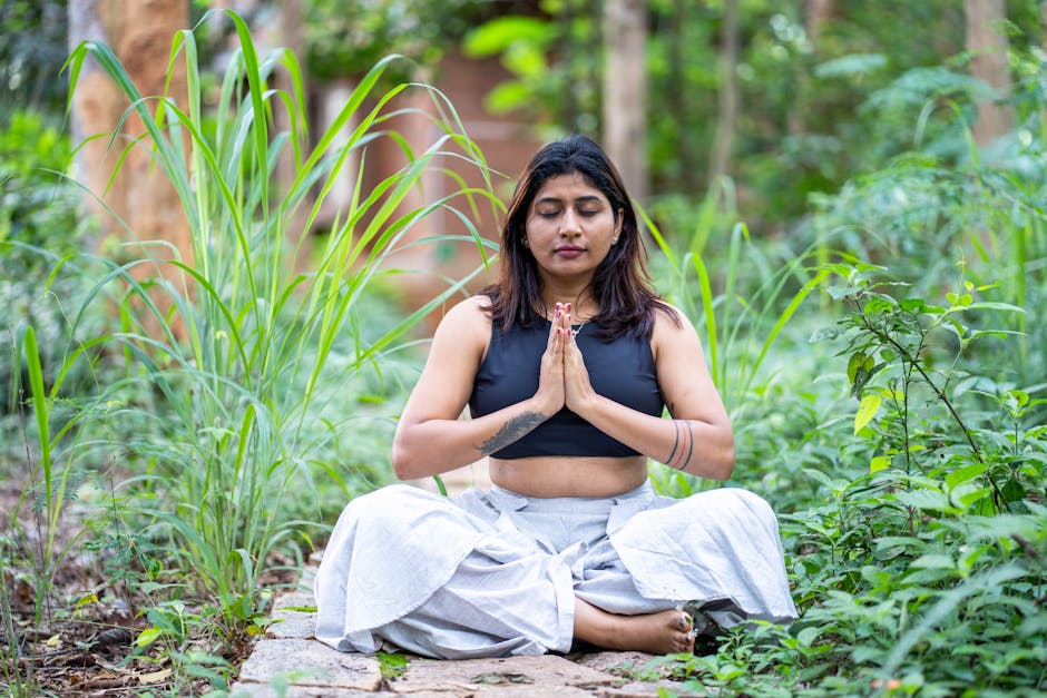 woman meditating peacefully in nature