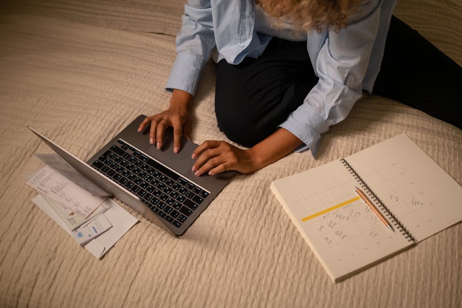 woman planning next day on laptop evening
